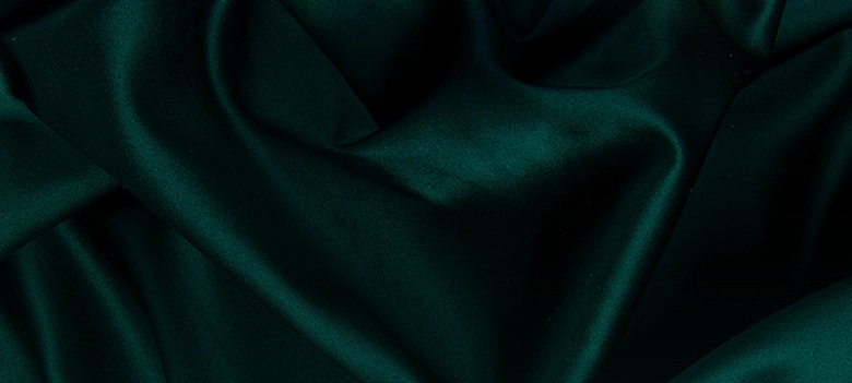 墨绿色丝绸质感珠宝背景图