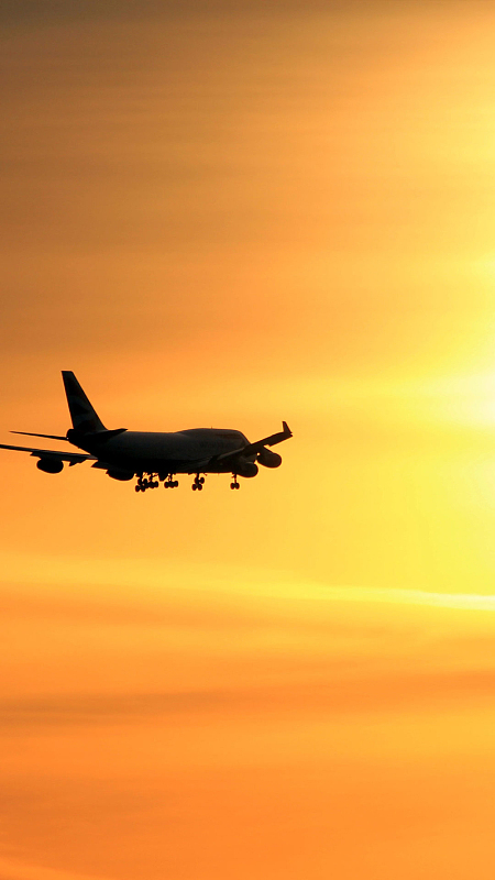 天空中的飞机黄昏背景h5背景素材