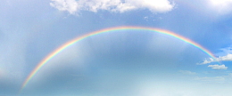 小暑雨后彩虹蓝色清新背景
