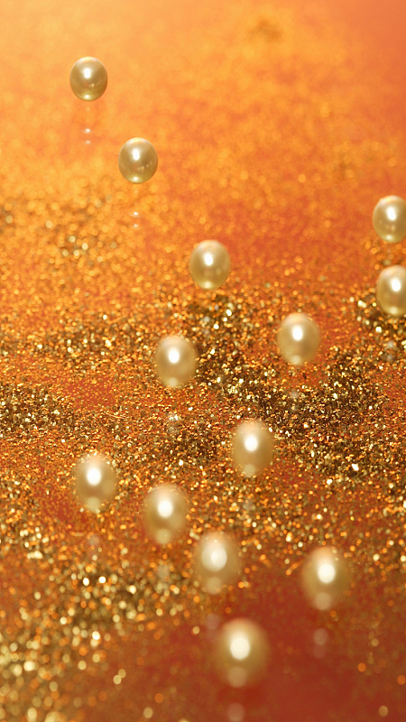 橙色背景上的珍珠素材