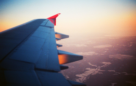 飞机机翼云朵空中旅行夕阳