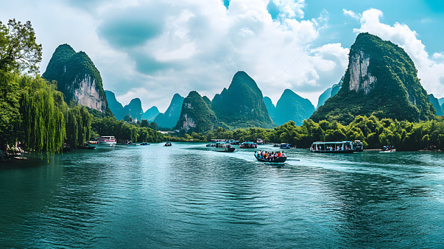 蓝天白云下的河流与山水船只风光桂林旅游
