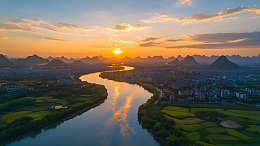 夕阳下城市河流与群山风景桂林旅游壁纸
