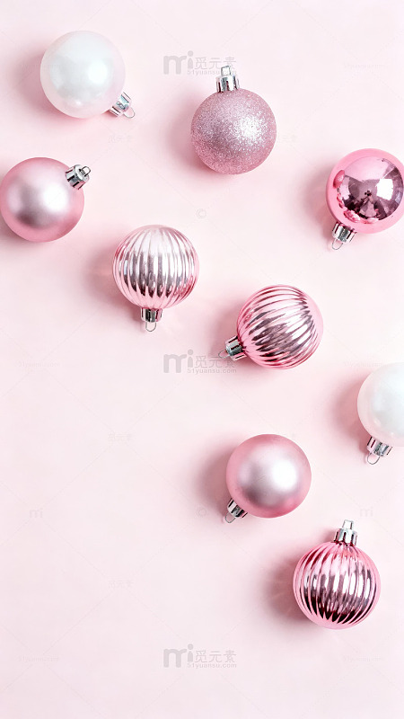 粉色背景上散落着多种质感的粉色装饰球