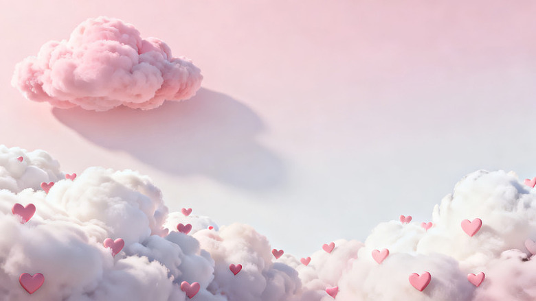 粉色云朵与爱心点缀梦幻背景