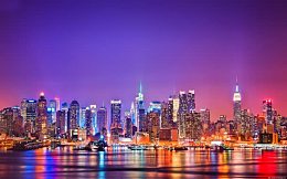 夜下多彩的水边城市海报背景