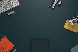 绿色办公桌海报背景