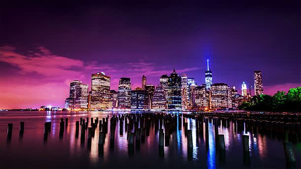 紫色夜空灯火通明的城市海报背景