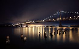 海上大桥的夜景海报背景