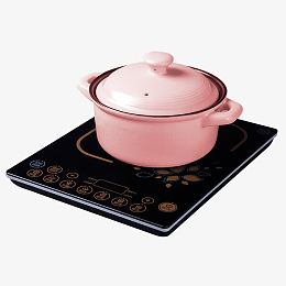粉色砂锅放在电磁炉上