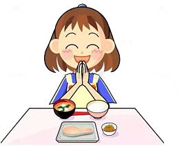 饭桌前的小女孩