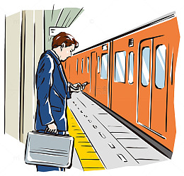 火车站站台等车的商务男士