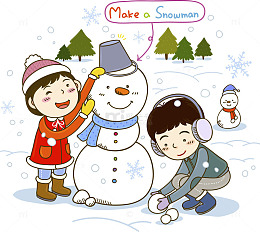 下雪天堆雪人的小孩