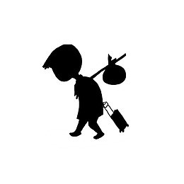 拉着行李箱的男孩剪影