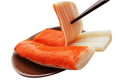 筷子夹起的蟹肉棒