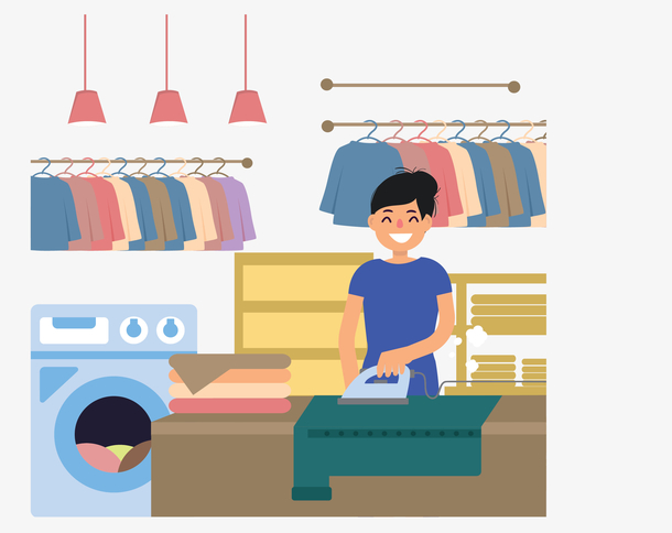 洗衣店熨烫衣服的人