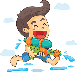 夏天开心玩水枪的男孩