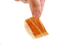 红色美味的食物手捏着切片的西班