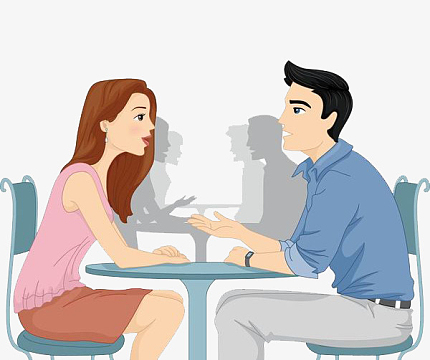 饭桌上聊天吃饭的男女