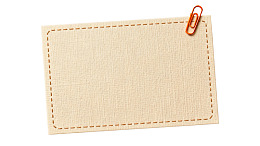 米色布纹纸张配红色夹子