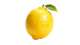单个带叶柠檬特写图片