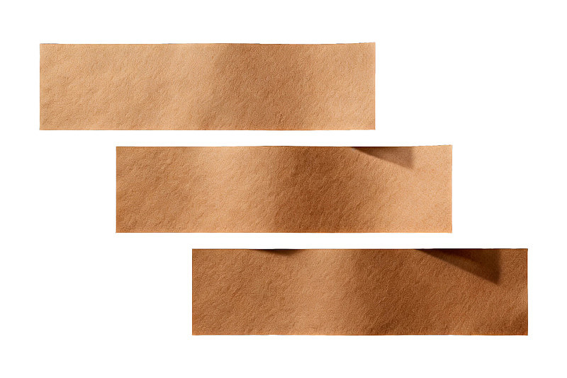 三块棕色纹理纸张的特写