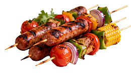 美味烤香肠串配蔬菜图片