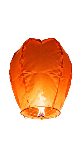 橙色孔明灯燃烧升空图片