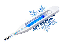 体温计置于雪花之上图片
