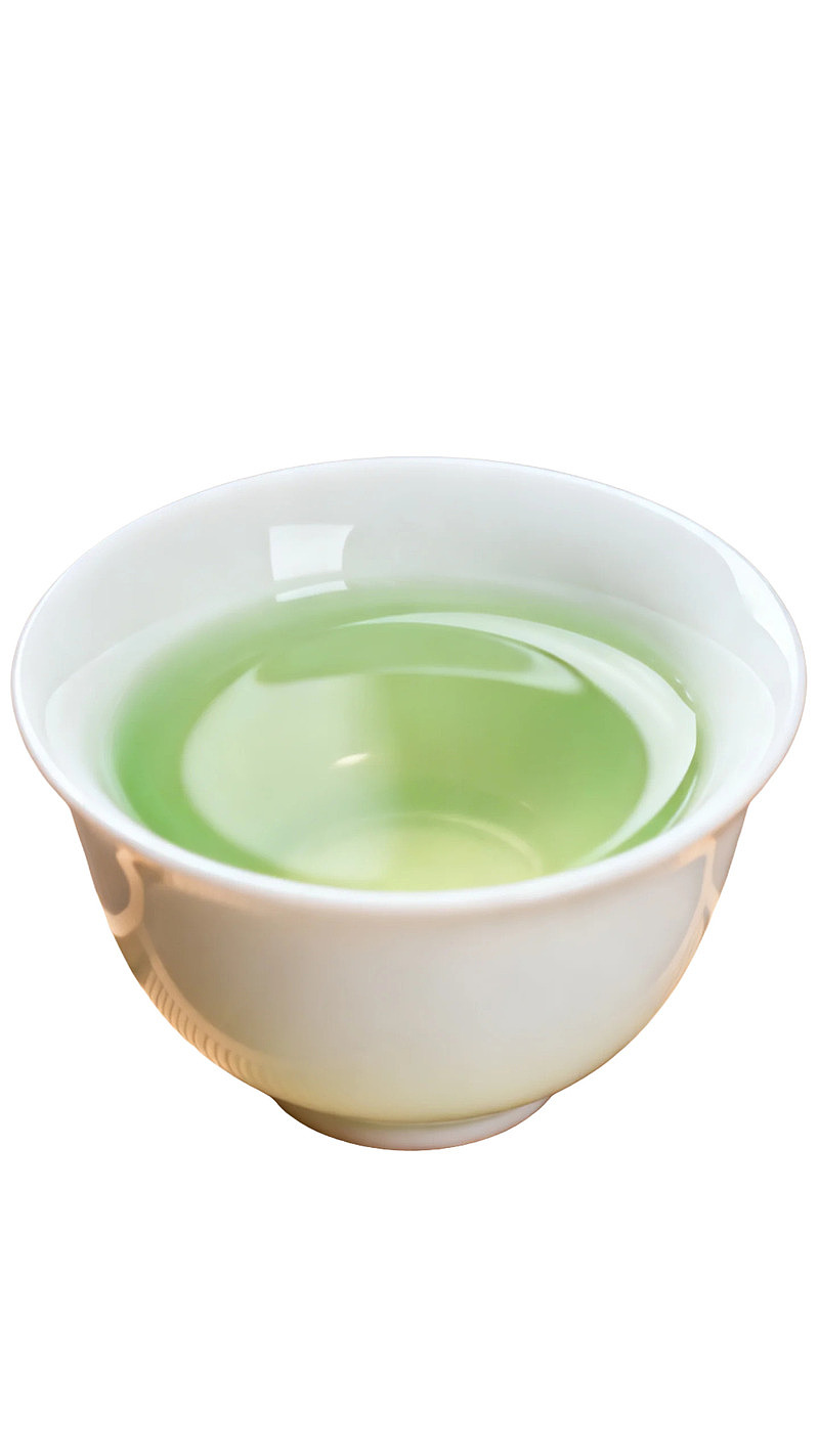 白瓷碗中盛放的绿茶图片
