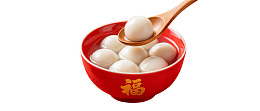 红碗盛汤圆勺舀一颗图片