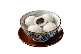 青花瓷碗中的汤圆图片