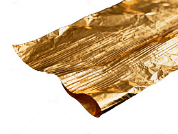 金色褶皱纸纹理背景