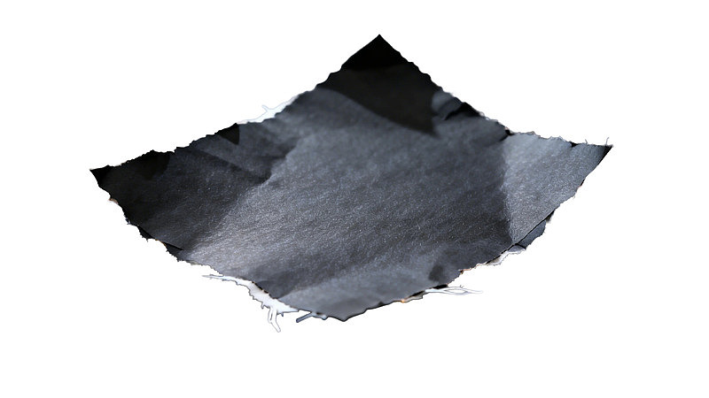 撕裂纸张的纹理特写图片