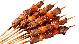 烤牛肉串撒芝麻辣椒图片