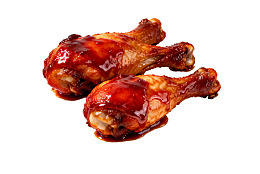 两块淋满酱汁的鸡腿图片
