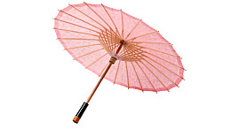 粉色纸伞静置于白底之上