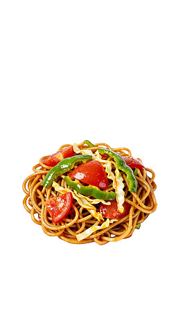 一碗拌有蔬菜的炒面图片