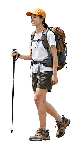 女子户外徒步携带登山杖