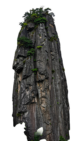 高耸岩峰绿植点缀图片