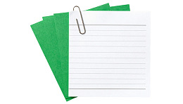 绿色纸张与金属夹子图片