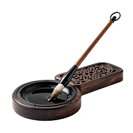 传统毛笔与木质砚台图片