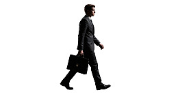 商务男士手提公文包行走