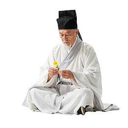 老者盘坐手持黄花图片