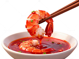 筷子夹龙虾红色汤汁美食图片