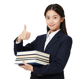 青年女性手捧书本竖大拇指