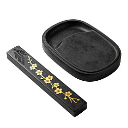 黑色石砚配金色花卉纹饰